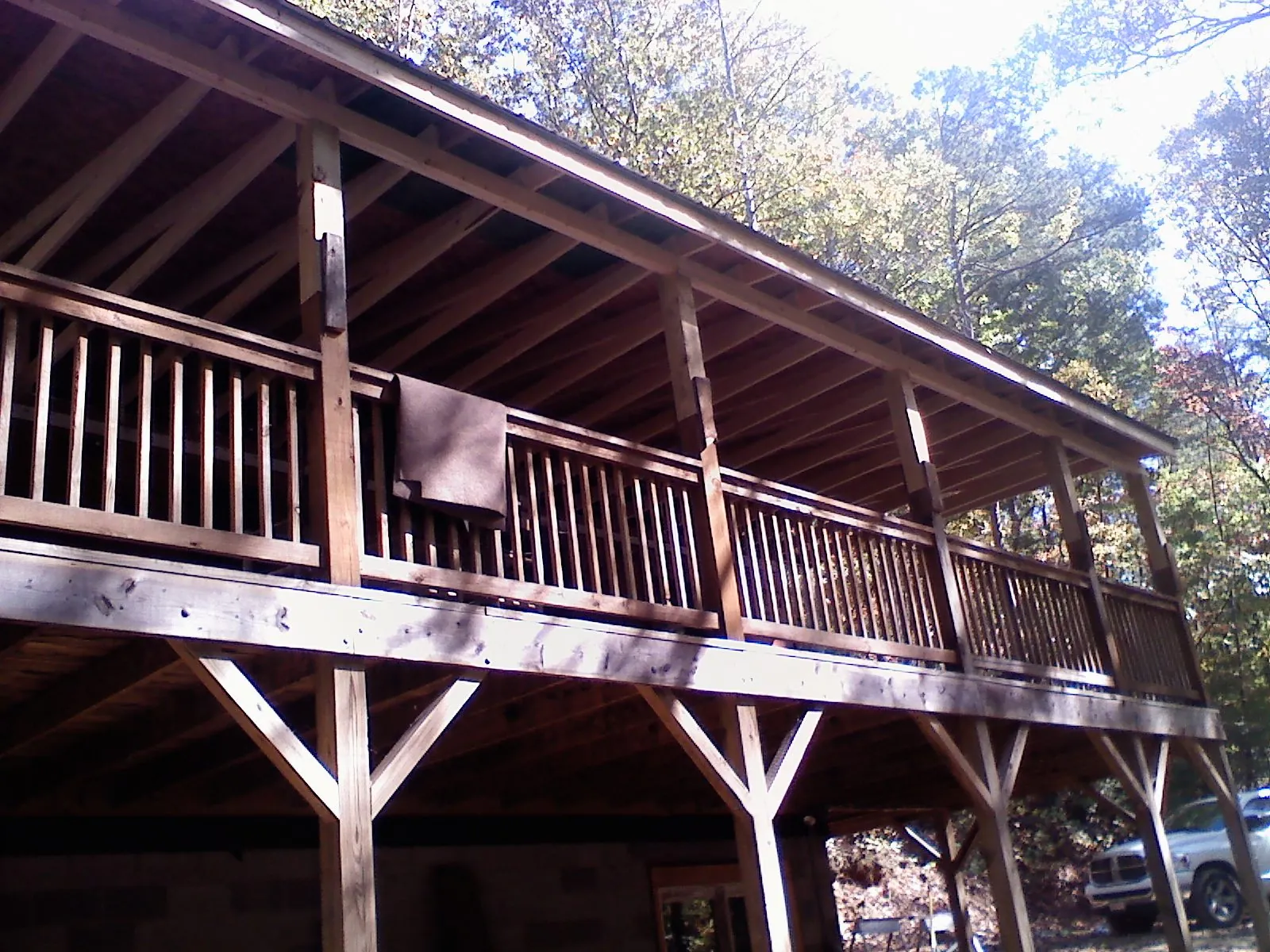 Timber framing under a new elevated porch and deck — Roof Leak Repair in Harshaw by Roofing Brothers